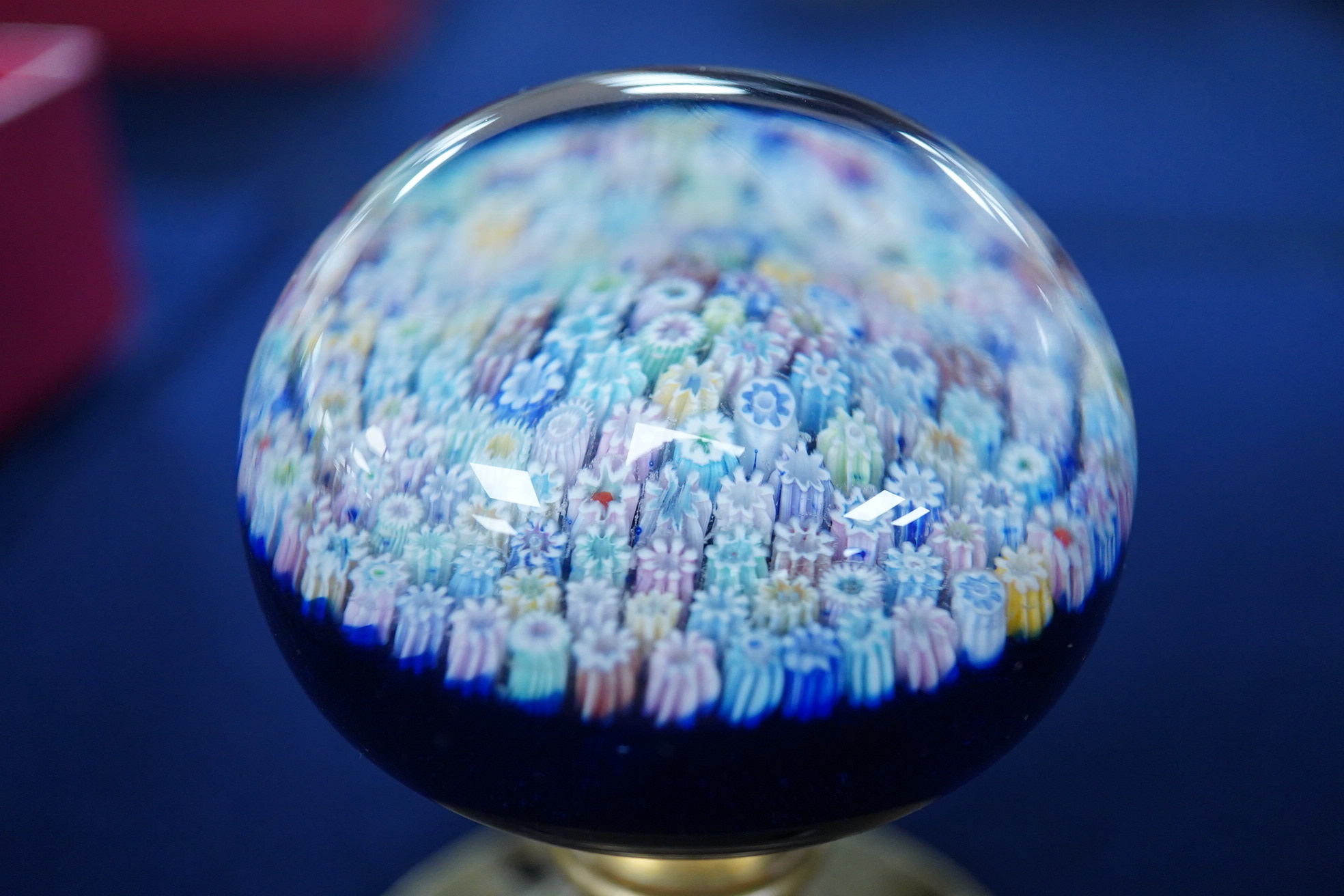 A Perthshire PP18 cane millefiori glass door handle/ paperweight, 6cm in diameter